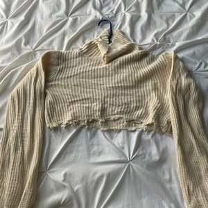 Distressed long sleeve cropped turtleneck
